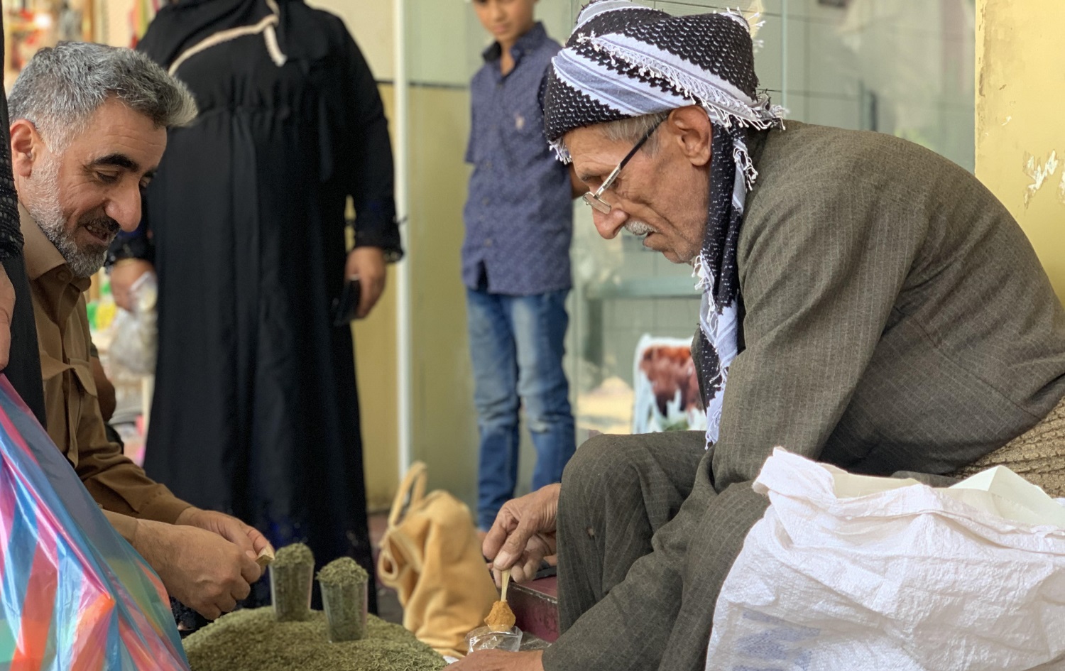 Rasul Ibrahim sells dried herbs at Koya's bazaar on July 21, 2020. Photo: Zhelwan Z. Wali / Rudaw